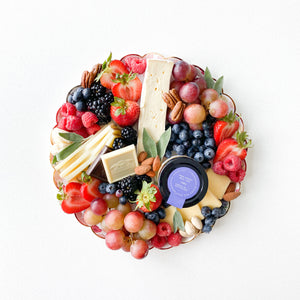 gluten free and vegetarian cheese board with creme brulee honey and fruits