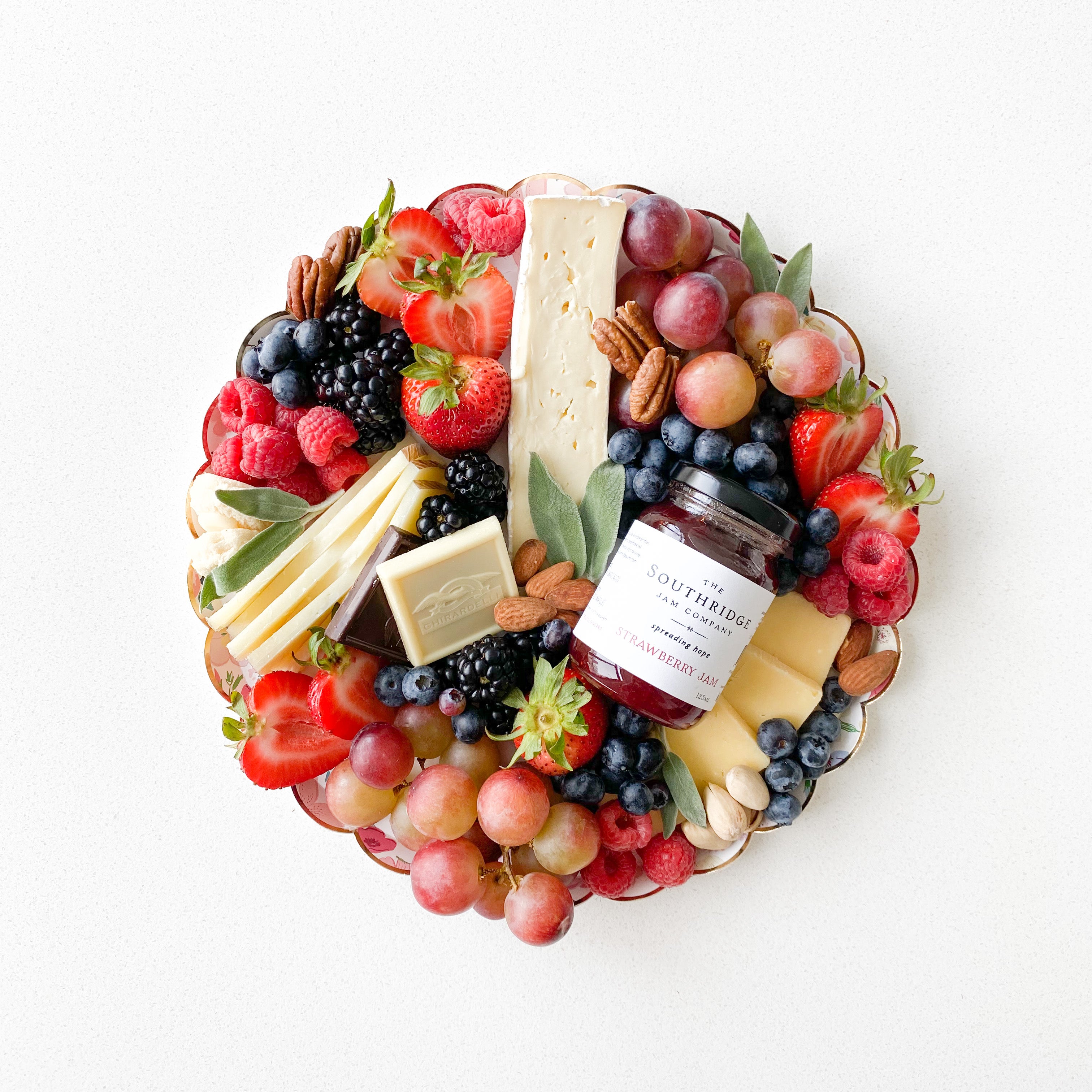 gluten free and vegetarian cheese board with jam and fruits