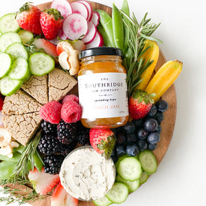 vegan cheese platter with fruits, vegetables and jam